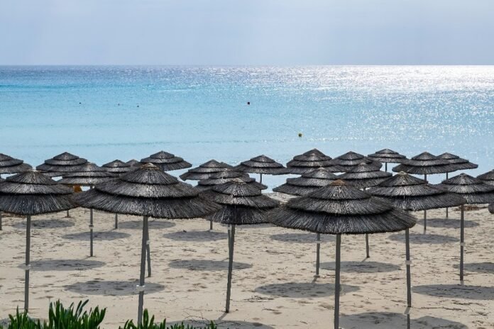 empty-beach-with-umbrellas-morning